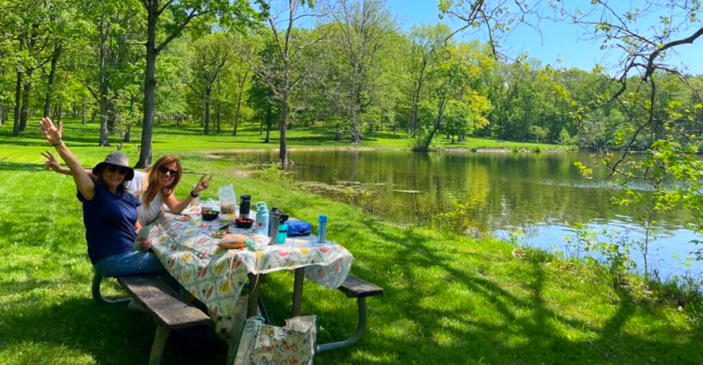 This Massive Michigan Park Has River Trails, World-Class Disc Golf, and Wild Birds That Land on Your Hand