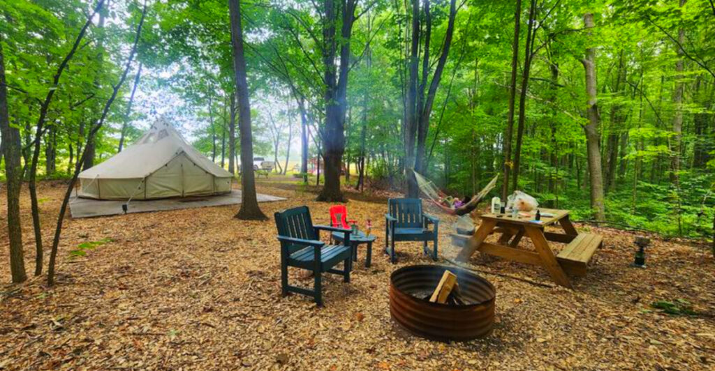 This Michigan Campground Lets You Bike Straight Onto One of the State’s Most Beautiful Rail Trails