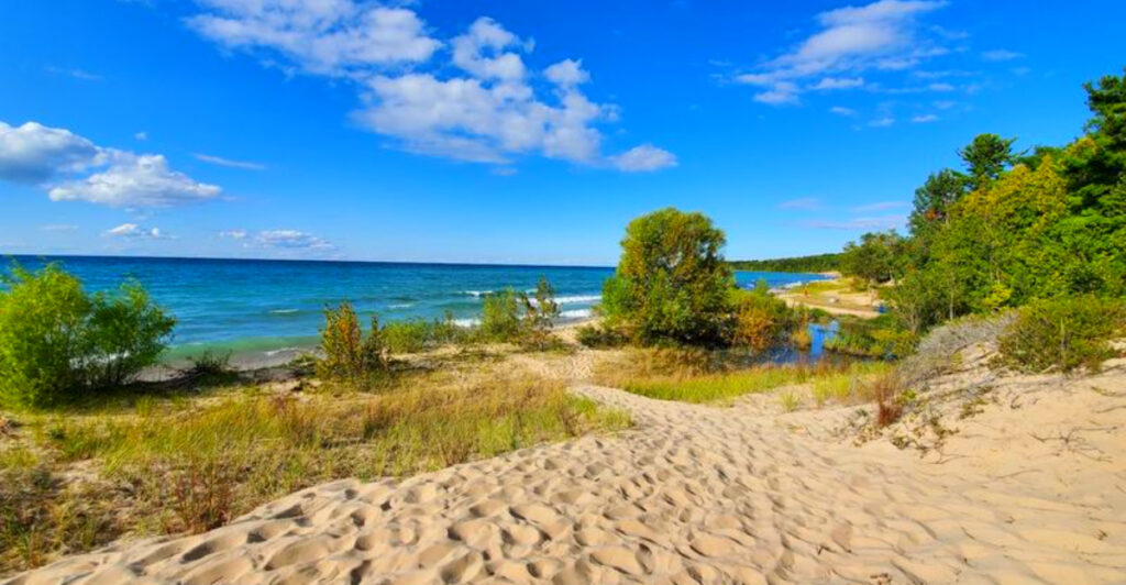 This Rustic Michigan Campground Has Quiet Lake Michigan Beaches and Waterfront Campsites