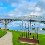 This Scenic Michigan Trail Follows Crystal-Blue Water for 54 Miles Through Waterfront Towns