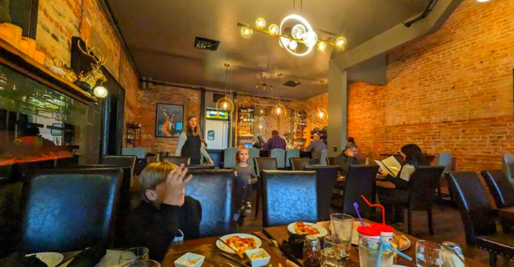 This Tiny Michigan Spot in an 1896 Building Is Drawing Crowds for Elk Saltimbocca and Wood-Fired Pizza