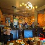 This Tiny Michigan Spot in an 1896 Building Is Drawing Crowds for Elk Saltimbocca and Wood-Fired Pizza