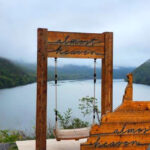 This Underrated West Virginia State Park Has Mountain Views, Bald Eagles, and a Lakeside Swing Everyone Photographs