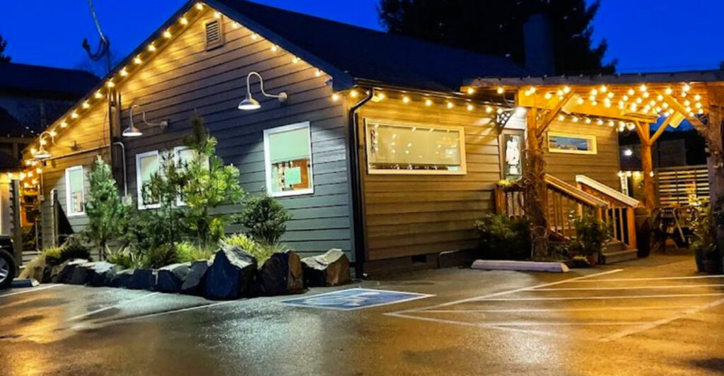 This Unique Oregon Coast Coffee Spot Is Set in a Greenhouse With Stunning Vintage Chandeliers