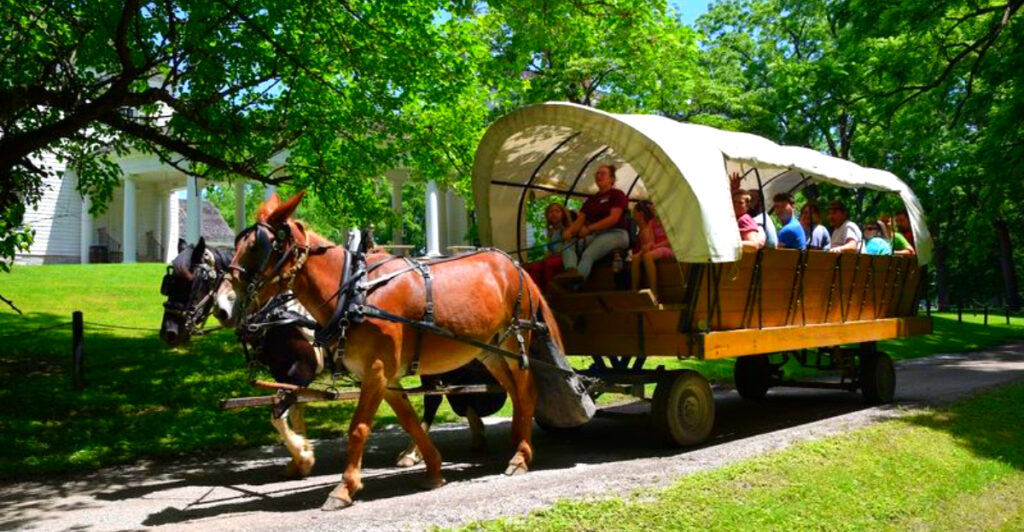 This West Virginia Island State Park Has a Real Sternwheeler Ferry, Horse-Drawn Carriages, and a Mansion Rebuilt From Ashes