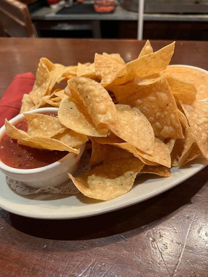 Tortilla Chips, Salsa, and the Famous Queso Tortilla Chips, Salsa, and the Famous Queso