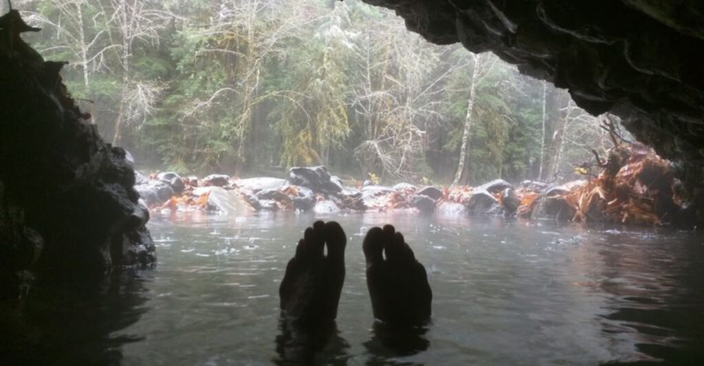 Tucked Along the River, This Oregon Grotto Hides a Natural Hot Spring Few People Know About