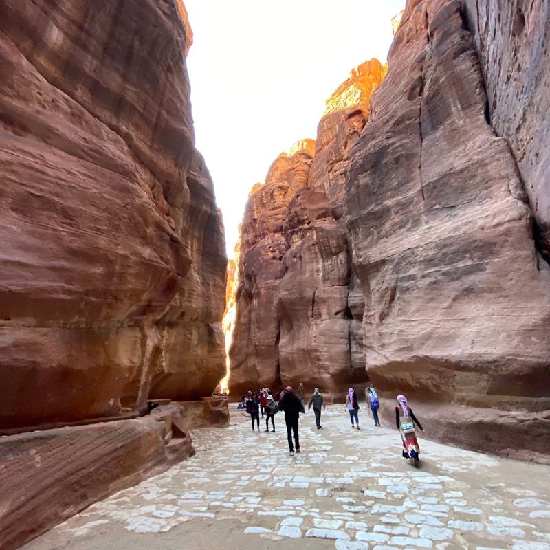 Visiting Petra Through the Siq at Sunrise, Jordan Visiting Petra Through the Siq at Sunrise, Jordan