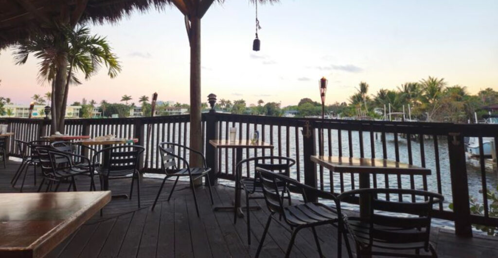 You’d Never Guess This Strip Mall Spot Leads to a Stunning Waterfront Restaurant