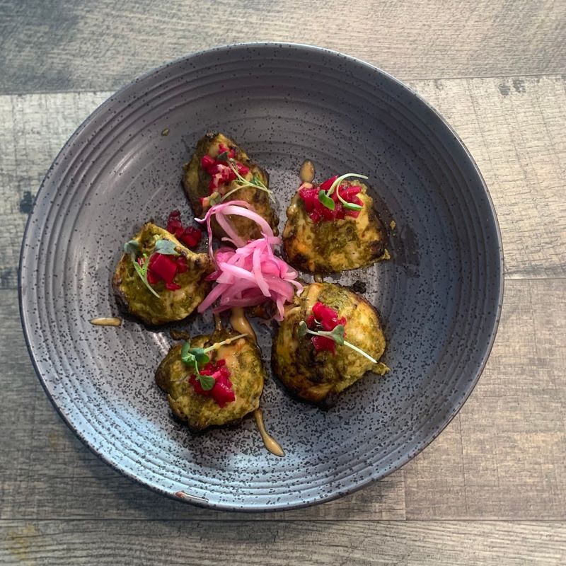 Complimentary Spinach Fritters: The Welcome Gift