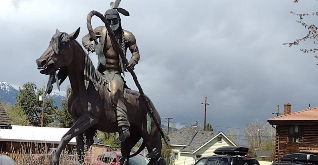 More Bronze Statues Than Residents and a Brilliant Blue Lake Make This Oregon Town One of a Kind
