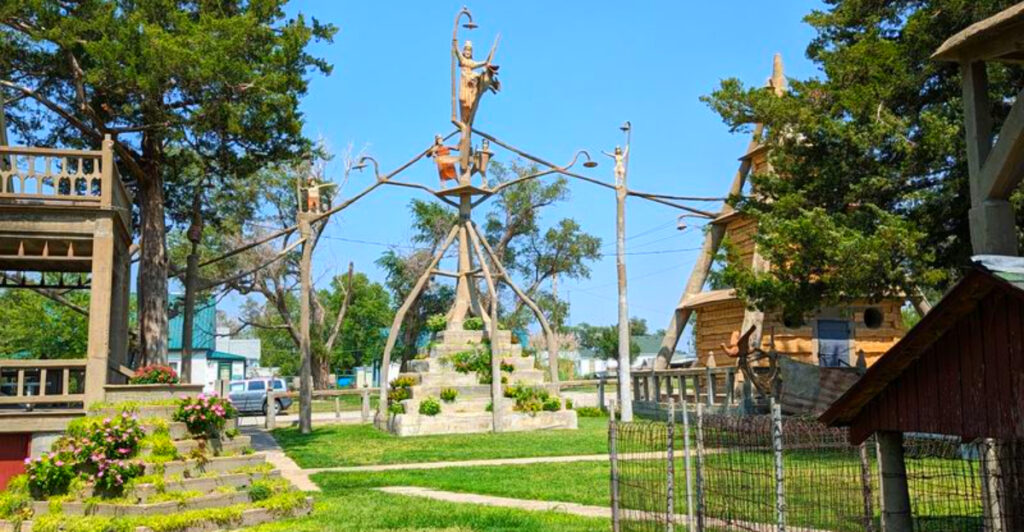 One Man Spent 20 Years Building This Bizarre Kansas Garden With 150 Concrete Sculptures and His Own Glass Coffin