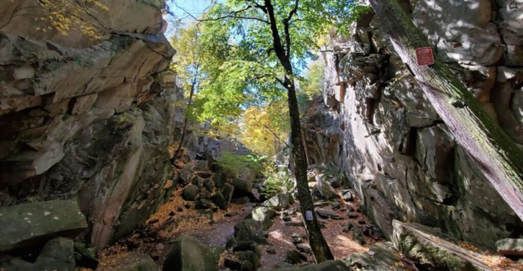 One Of Massachusetts’ Strangest Rock Formations Sits Inside This Sutton Reservation