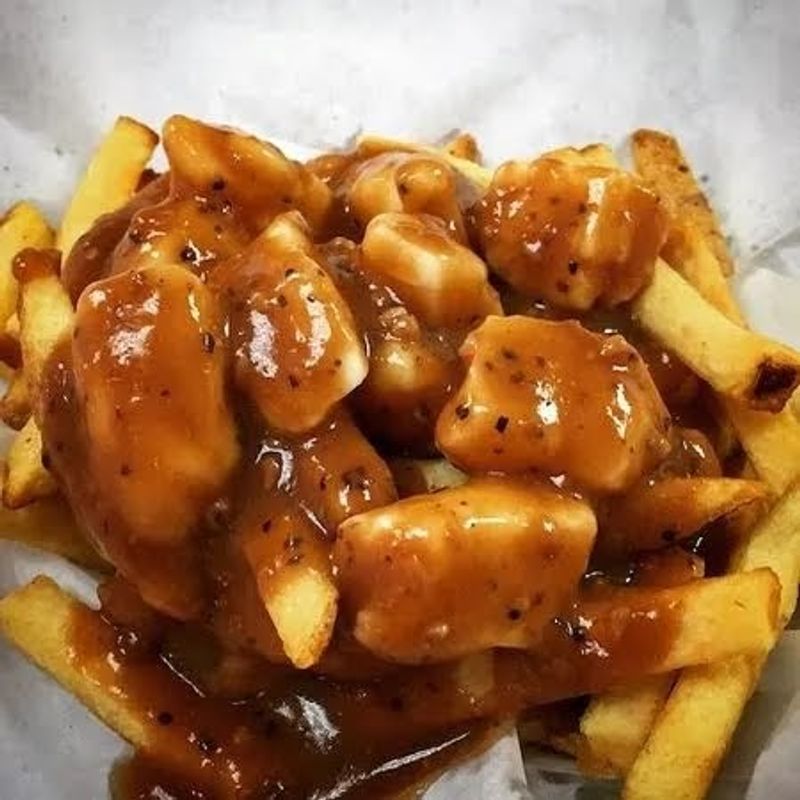 Poutine on the Menu at a Fish and Chips Shop Poutine on the Menu at a Fish and Chips Shop