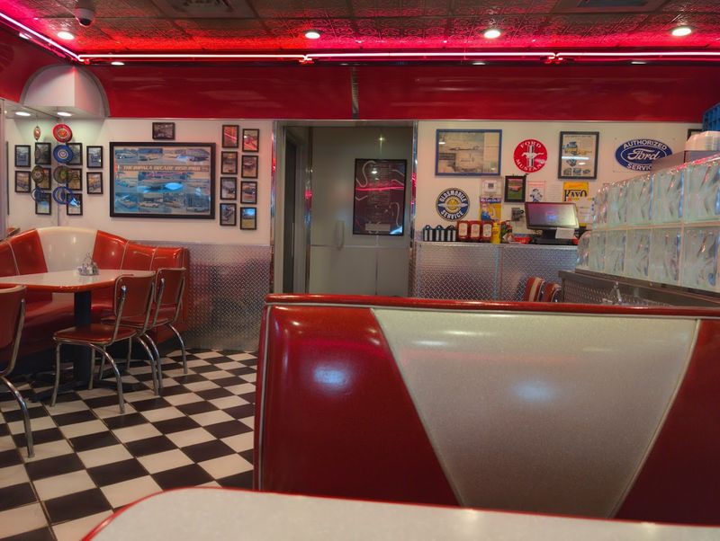 The Atmosphere: Red Booths and Retro Vibes