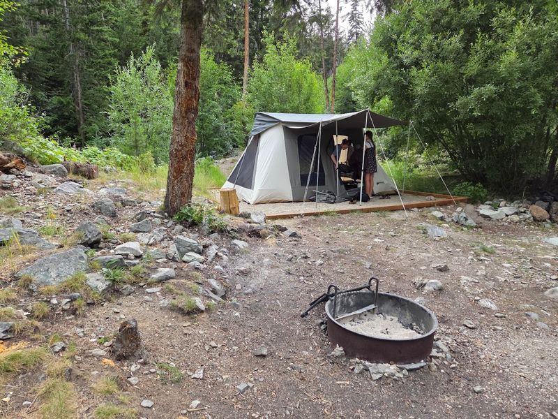 The Campground Tucked Into the Trees Along the Creek