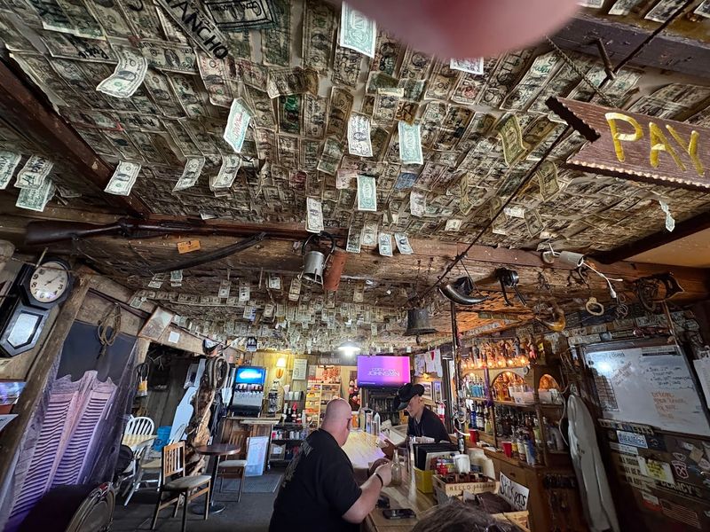 The Ceiling Covered in Dollar Bills