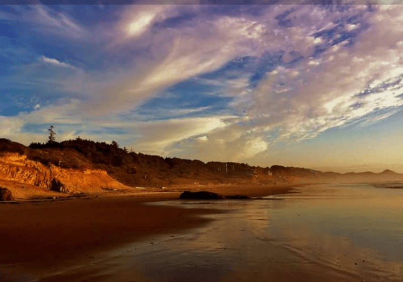 The Dark Sand and What Causes It