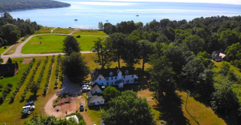The Northern Michigan Hidden Gem Where Hammocks, Bonfires, and a 135-Foot Porch Make Time Slow Down