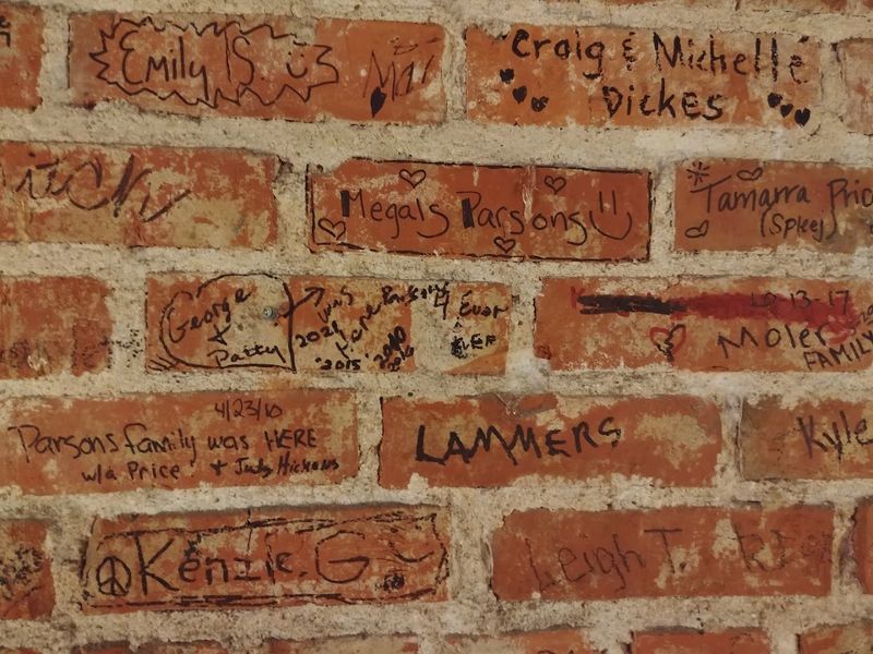 The Signature Wall That Preserves Decades of Memories The Signature Wall That Preserves Decades of Memories