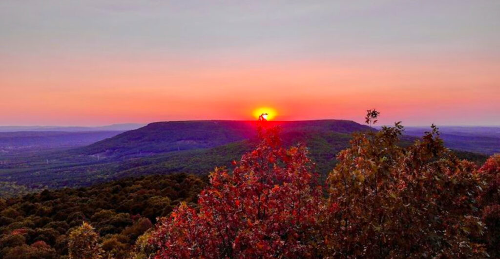 This Arkansas Mountaintop Park Has 11 Hairpin Curves, Epic Bluff Views, and Sunsets You’ll Never Forget