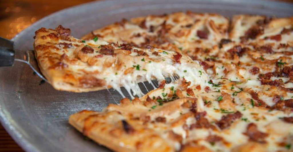 This Arkansas Restaurant Is Famous for Wood-Fired Pizza, Live Music, and Portions That Practically Guarantee Leftovers