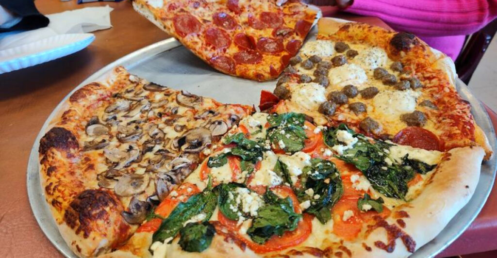 This Concord Pizza Shop Serves Massive New York-Style Slices That Barely Fit on the Plate