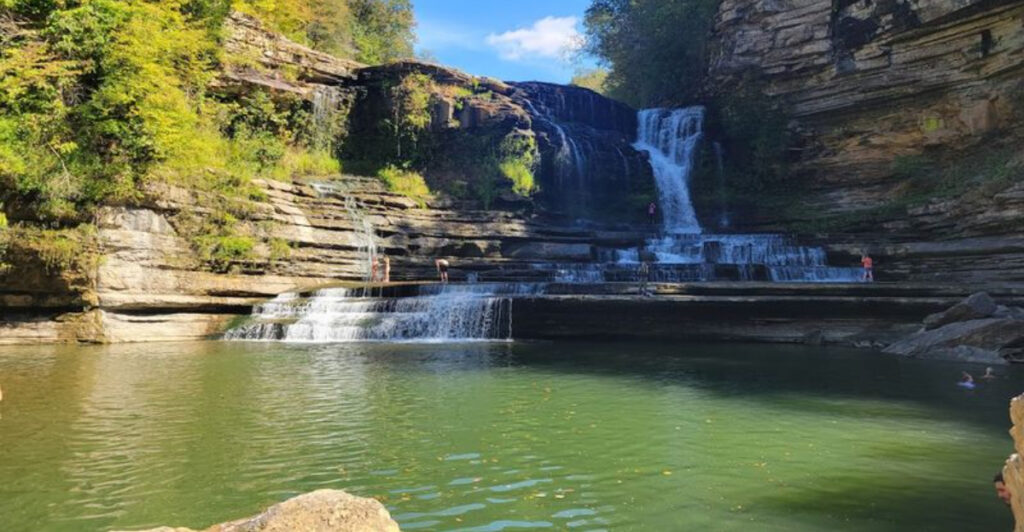 This Cookeville Waterfall Drops 75 Feet Into A Natural Tennessee Swimming Pool