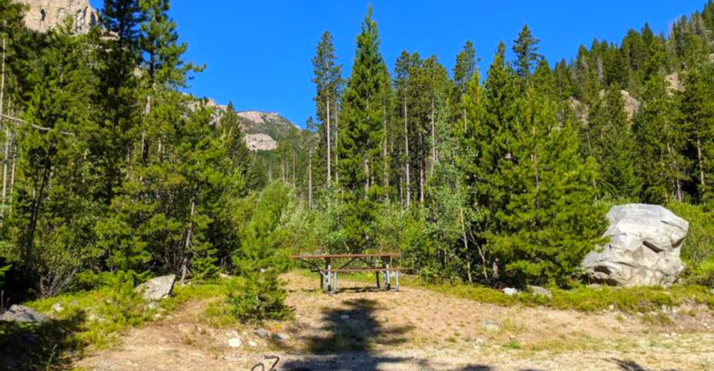 This Hidden Montana Canyon Has a 50-Foot Waterfall, Towering Cliffs, and Forest Trails Most Visitors Miss