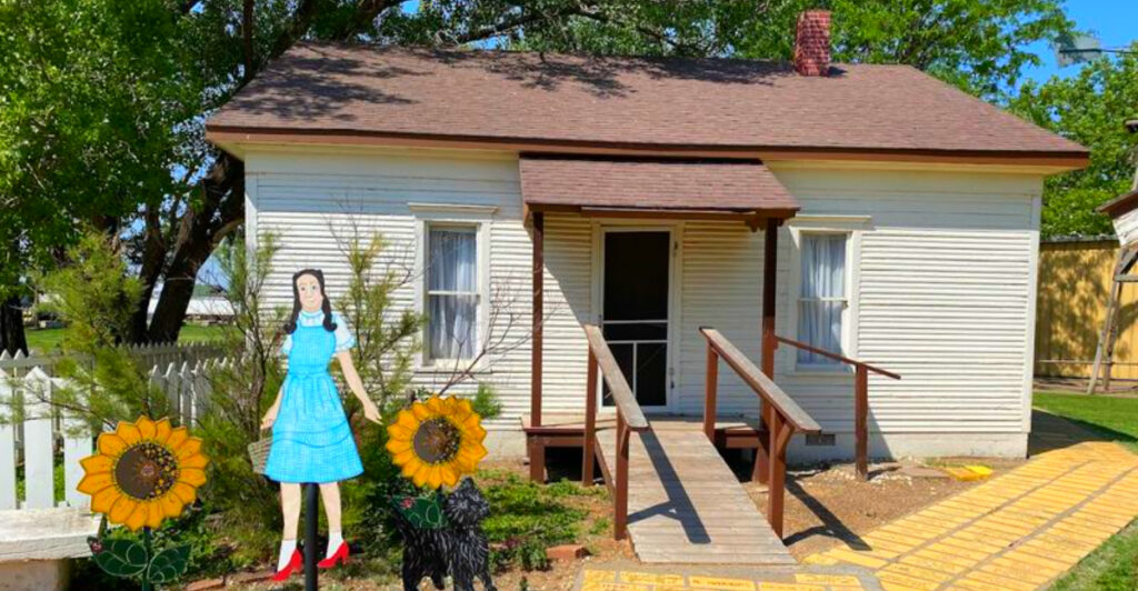 This Kansas Attraction Lets You Walk Through Dorothy’s House, Follow the Yellow Brick Road, and See a Real Movie Prop From The Wizard of Oz