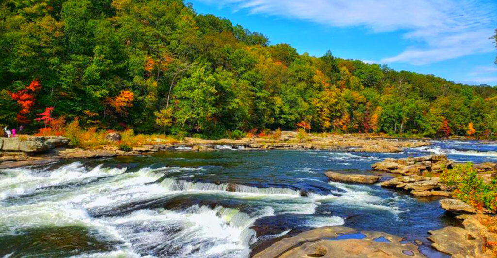 This Pennsylvania State Park Has a Waterfall You Can Walk Behind and Natural Waterslides Carved by Nature