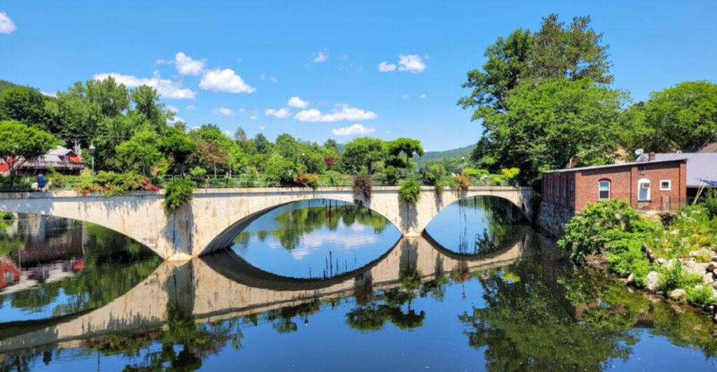 This Western Massachusetts Bridge Connects Two Towns With Flowers Over The Deerfield River