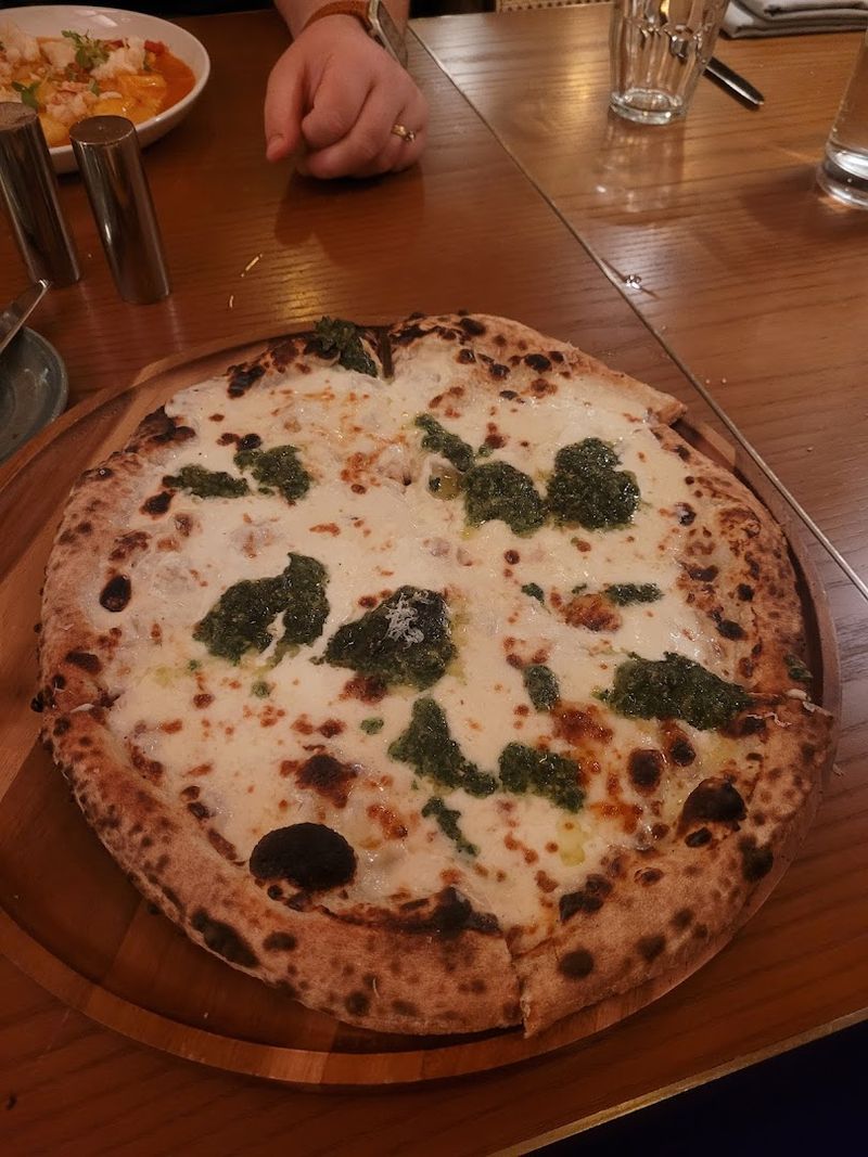 Wood-Fired Pizza in a Former Bank Vault City Wood-Fired Pizza in a Former Bank Vault City