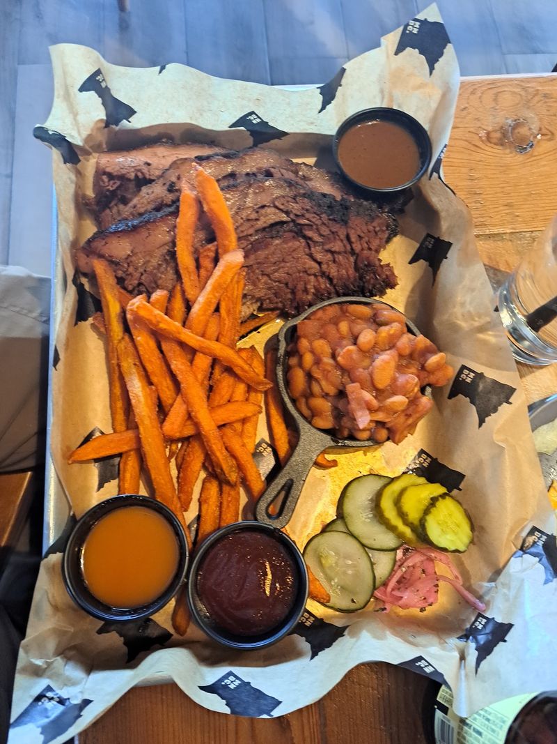 In-House Smoked Brisket That Arrives by Wheel In-House Smoked Brisket That Arrives by Wheel