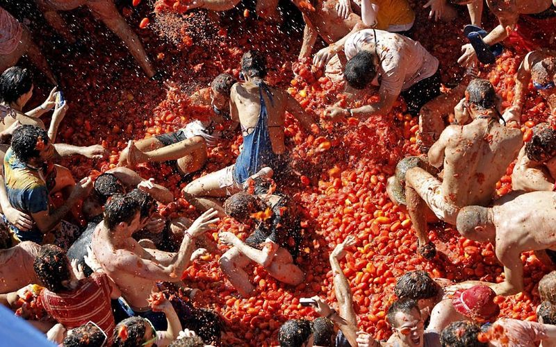 La Tomatina Turns A Small Valencian Town Into A Tomato-Filled Festival La Tomatina Turns A Small Valencian Town Into A Tomato-Filled Festival