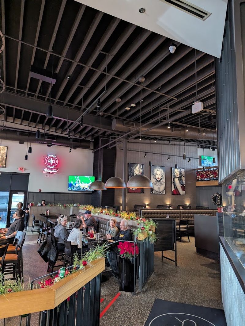 Local Art, Sports Legends, and a Room That Feels Like Lenexa's Living Room Local Art, Sports Legends, and a Room That Feels Like Lenexa's Living Room