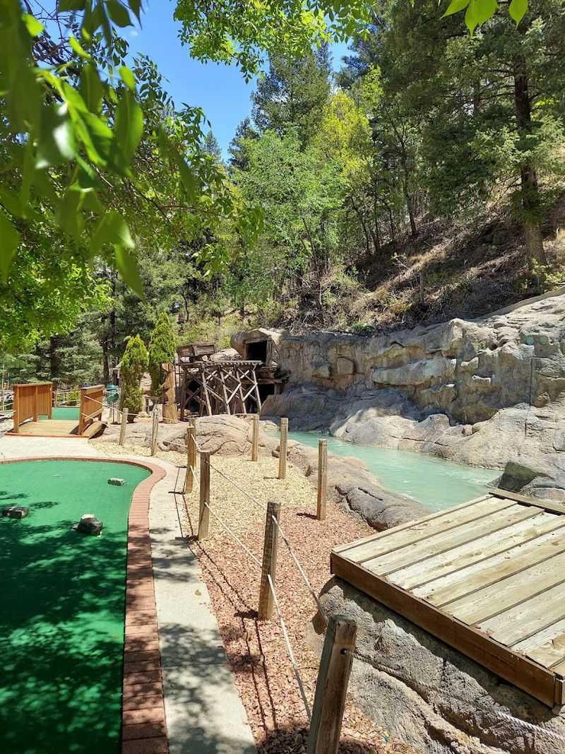 Mini-Golf With a Mountain Backdrop