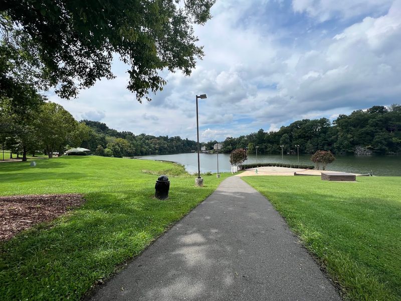 Paved Walking Trails With Benches Along The Way