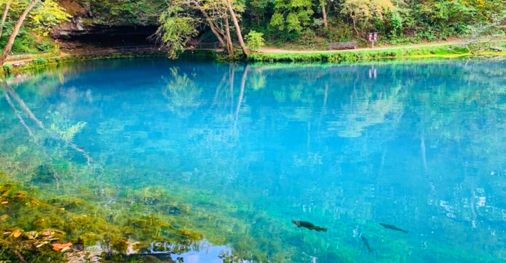 People Drive Across Missouri to See This Electric Blue Spring, Historic Iron Furnace, and Beautiful Riverside Trail