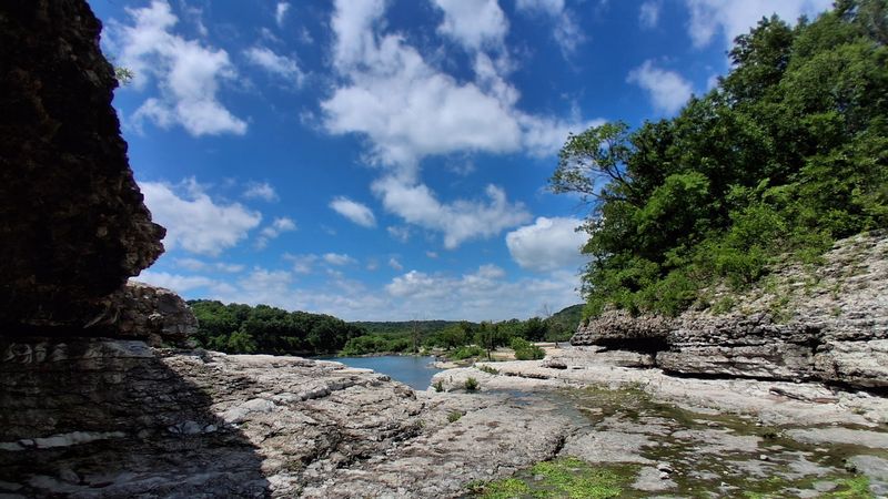 Rock Walls, a Waterfall, and a Cave Worth Exploring