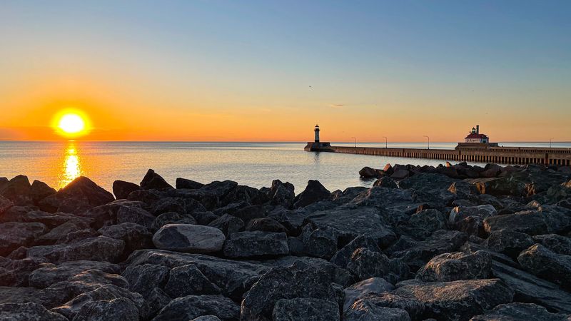 Sunrise and Sunset Views Over Lake Superior Sunrise and Sunset Views Over Lake Superior
