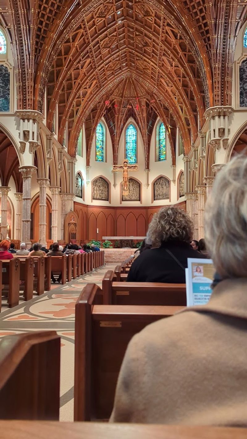 The Cardinal Hats Above the Altar