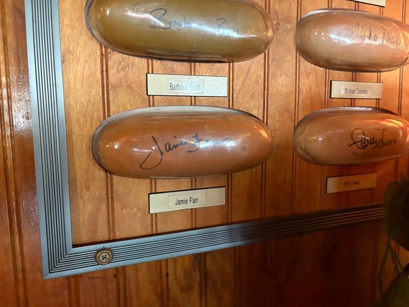 The Famous Wall of Signed Hot Dog Buns The Famous Wall of Signed Hot Dog Buns