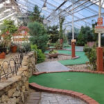 The Massachusetts Farm Where Mini Golf Happens Inside A Greenhouse