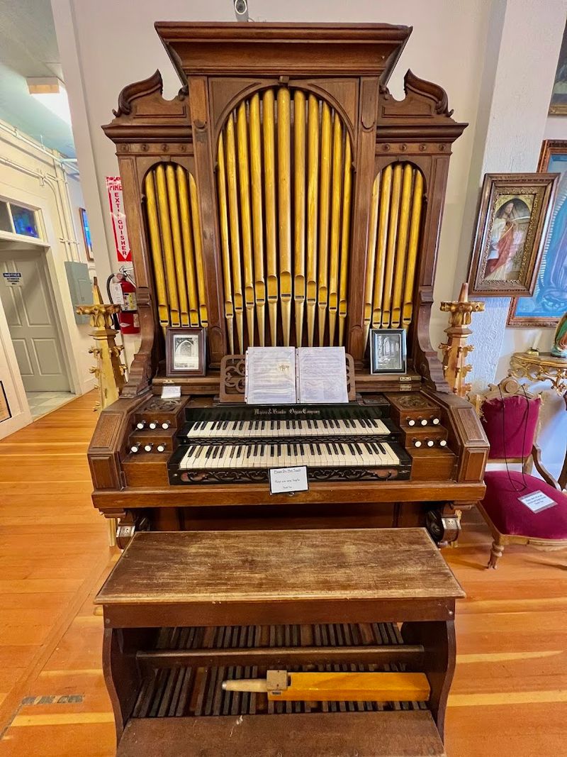 The Old Pipe Organ Still Standing in the Choir Loft The Old Pipe Organ Still Standing in the Choir Loft