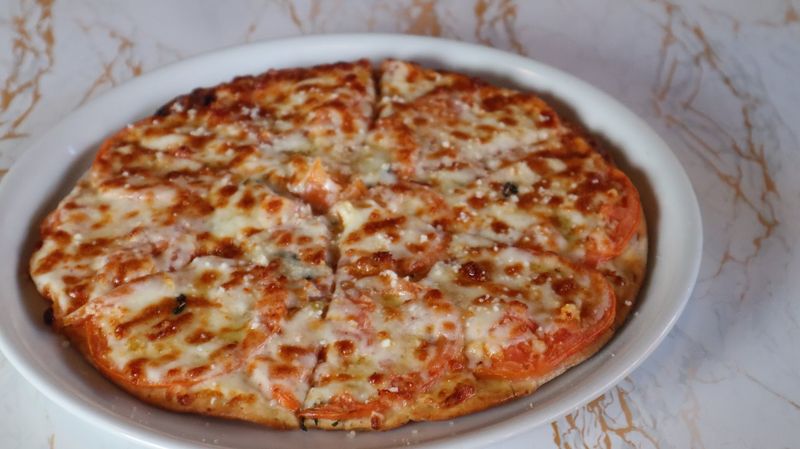 Thin-Crust Pizzas With a Personality Thin-Crust Pizzas With a Personality