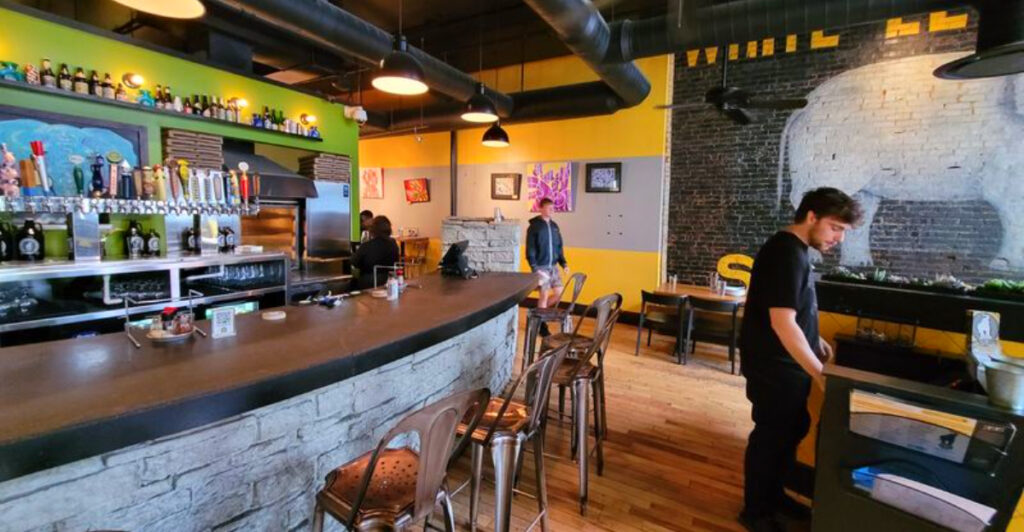 This Charleston Pizza Spot Is Famous for Inventive Pizzas, Craft Beer, and a Stone Hearth Oven