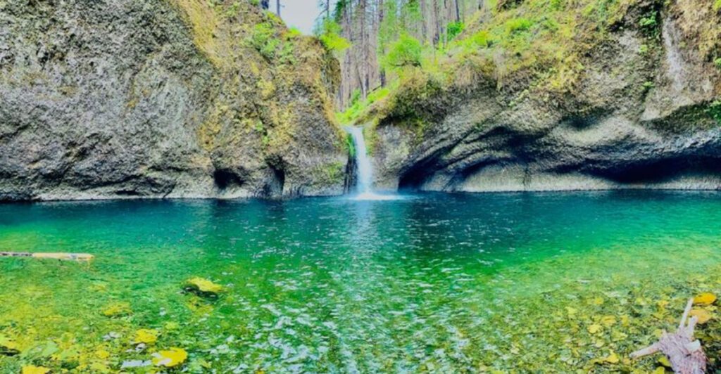 This Oregon Swimming Hole Requires a Two-Mile Waterfall Hike