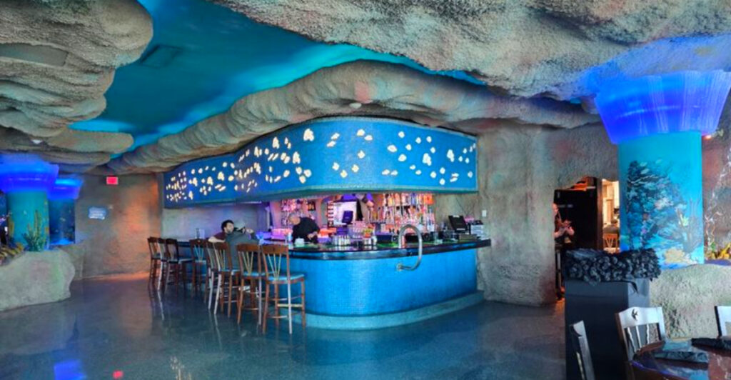 This Texas Restaurant Lets You Dine Beside a Massive Aquarium Filled With Sharks