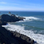 This Underrated Oregon Beach Is a Rare Blend of Black Sand and Sea Caves